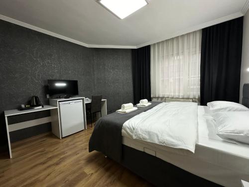 Imagen de la habitación del &Ouml;zdemir Inn Otel. Foto 20