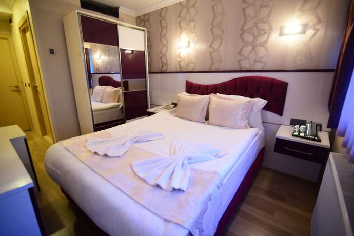 Imagen de la habitación del &Ouml;zdemir Palas Hotel. Foto 6