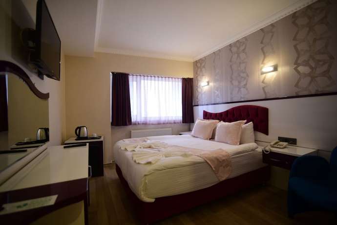 Imagen de la habitación del &Ouml;zdemir Palas Hotel. Foto 7