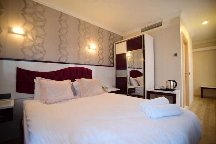 Imagen de la habitación del &Ouml;zdemir Palas Hotel. Foto 11