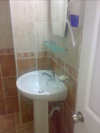 Imagen de la habitación del Our Place Hotel. Foto 10
