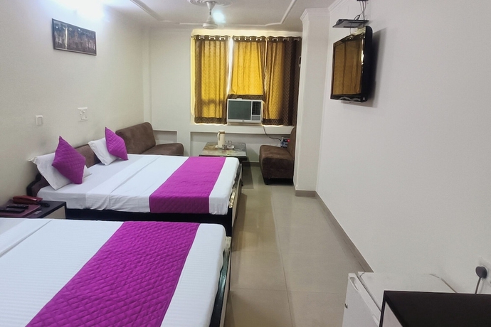 Imagen de la habitación del Oyo 12253 Jigyasa Palace. Foto 4