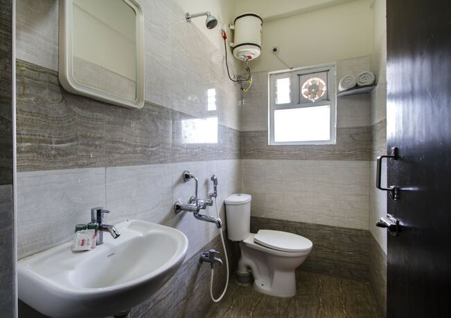 Imagen de la habitación del Oyo 6749 The Royal Nest. Foto 5