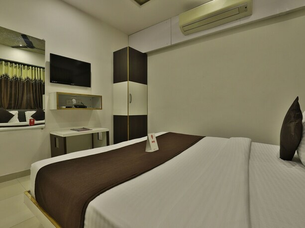 Imagen de la habitación del Oyo 8406 Hotel Marigold. Foto 4