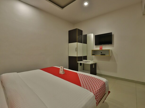 Imagen de la habitación del Oyo 8406 Hotel Marigold. Foto 5
