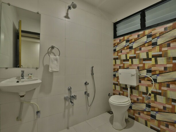 Imagen de la habitación del Oyo 8406 Hotel Marigold. Foto 12