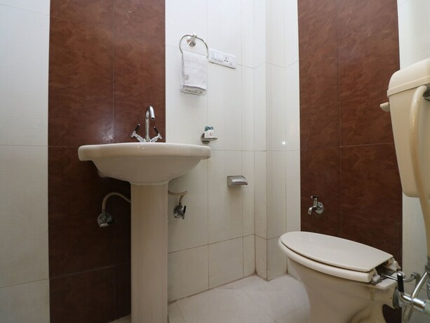 Imagen de la habitación del Oyo 9847 Hotel Blue Empire. Foto 11