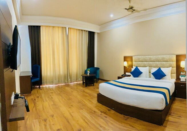 Imagen de la habitación del Oyo 9847 Hotel Blue Empire. Foto 12