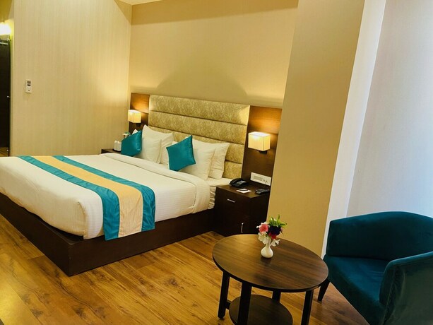 Imagen de la habitación del Oyo 9847 Hotel Blue Empire. Foto 13