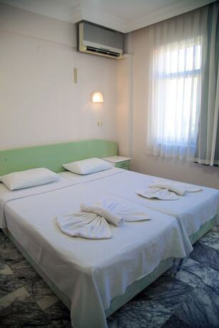 Imagen de la habitación del Ozay Apart Hotel. Foto 15