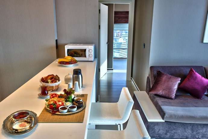 Imagen de la habitación del Ozay Suites. Foto 4