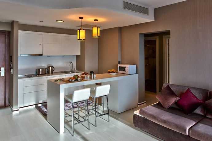 Imagen de la habitación del Ozay Suites. Foto 12
