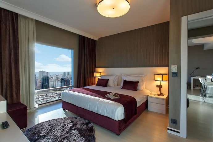 Imagen de la habitación del Ozay Suites. Foto 15