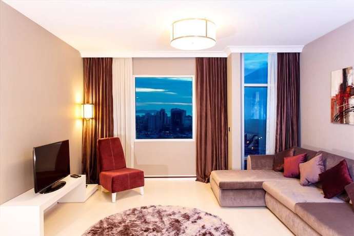 Imagen de la habitación del Ozay Suites. Foto 16