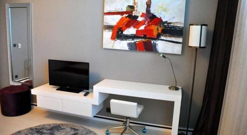 Imagen de la habitación del Ozay Suites. Foto 17