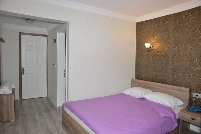 Imagen de la habitación del Ozbay Hotel. Foto 13