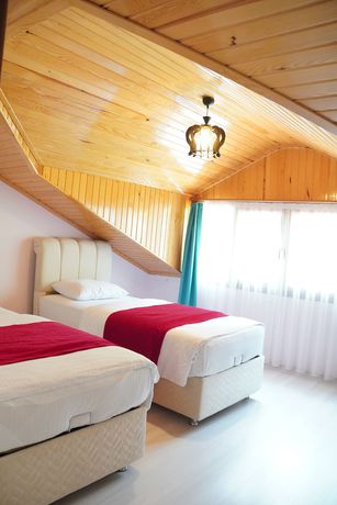 Imagen de la habitación del Ozbek Suit Hotel. Foto 11