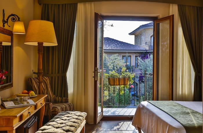 Imagen de la habitación del Palace Hotel Olive Odore. Foto 6