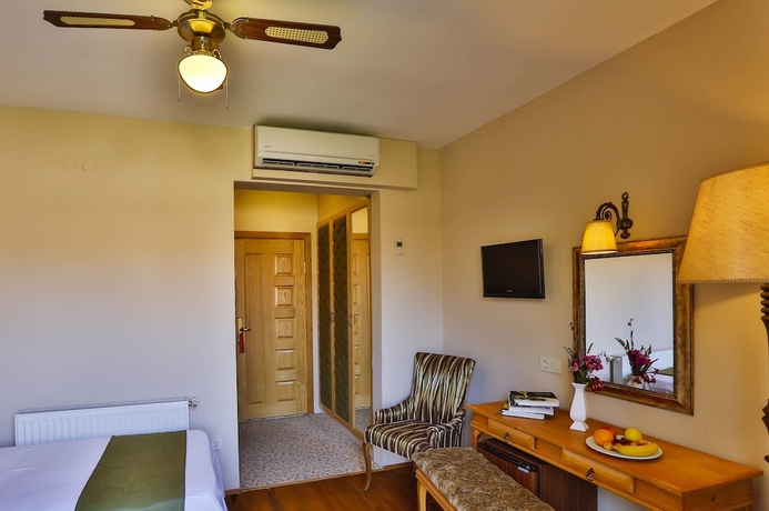 Imagen de la habitación del Palace Hotel Olive Odore. Foto 13