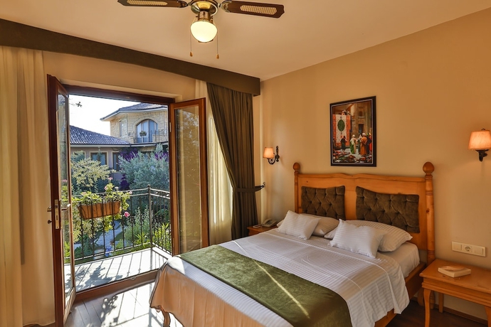 Imagen de la habitación del Palace Hotel Olive Odore. Foto 16