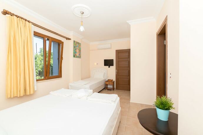 Imagen de la habitación del Palamutbükü Deniz Apart Otel. Foto 19