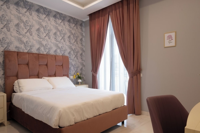 Imagen de la habitación del Palazzo Adele Rooms and Apartments. Foto 7