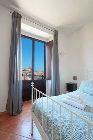 Imagen de la habitación del Palazzo Curr&ograve;. Foto 2