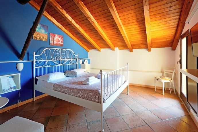 Imagen de la habitación del Palazzo Curr&ograve;. Foto 5