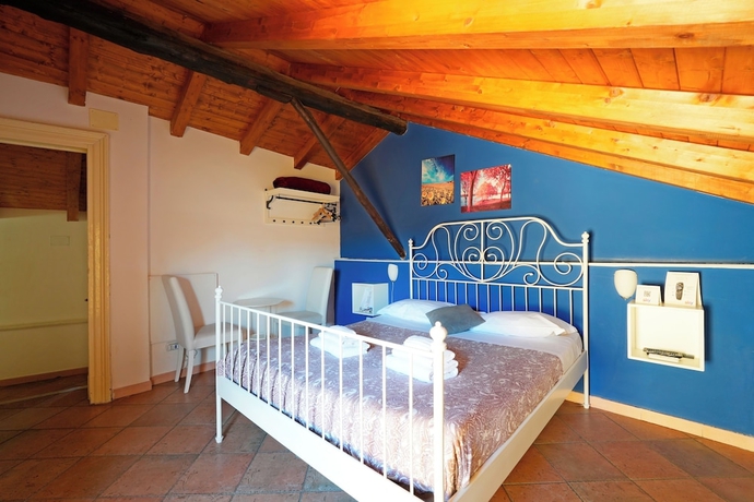 Imagen de la habitación del Palazzo Curr&ograve;. Foto 6