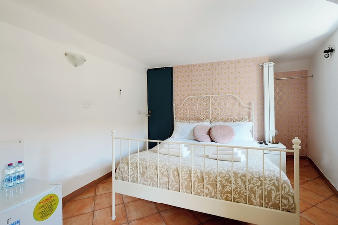 Imagen de la habitación del Palazzo Curr&ograve;. Foto 14