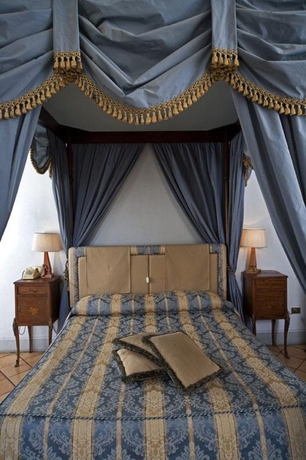 Imagen de la habitación del Palazzo Dragoni Residenza D'epoca. Foto 11
