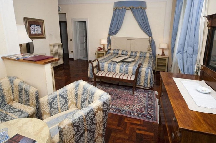 Imagen de la habitación del Palazzo Dragoni Residenza D'epoca. Foto 14