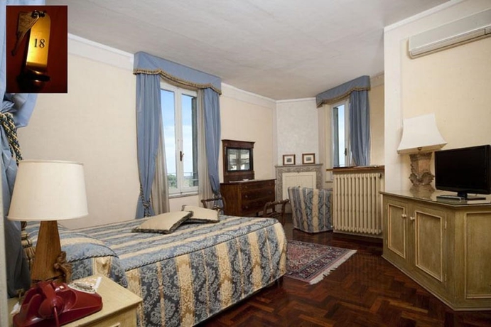 Imagen de la habitación del Palazzo Dragoni Residenza D'epoca. Foto 15