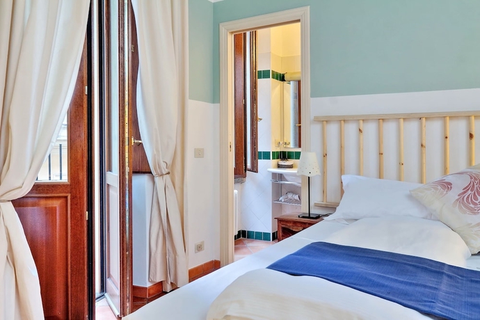 Imagen de la habitación del Palazzo Olivia Rooms & Apartments. Foto 10