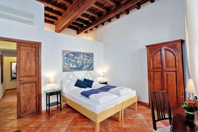 Imagen de la habitación del Palazzo Olivia Rooms & Apartments. Foto 13