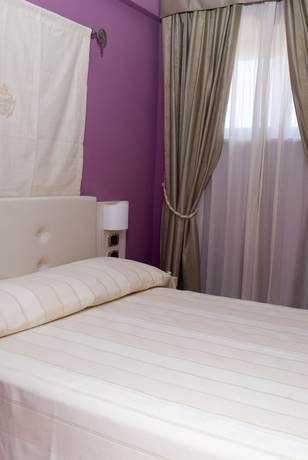 Imagen de la habitación del Palazzo Reginella Residence Hotel. Foto 4
