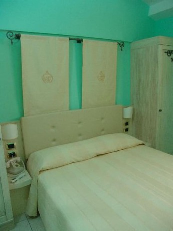 Imagen de la habitación del Palazzo Reginella Residence Hotel. Foto 11