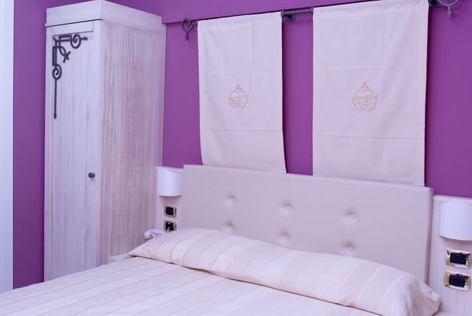 Imagen de la habitación del Palazzo Reginella Residence Hotel. Foto 13