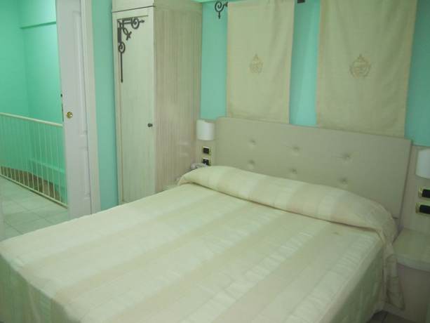 Imagen de la habitación del Palazzo Reginella Residence Hotel. Foto 17