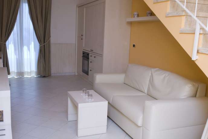 Imagen de la habitación del Palazzo Reginella Residence Hotel. Foto 18