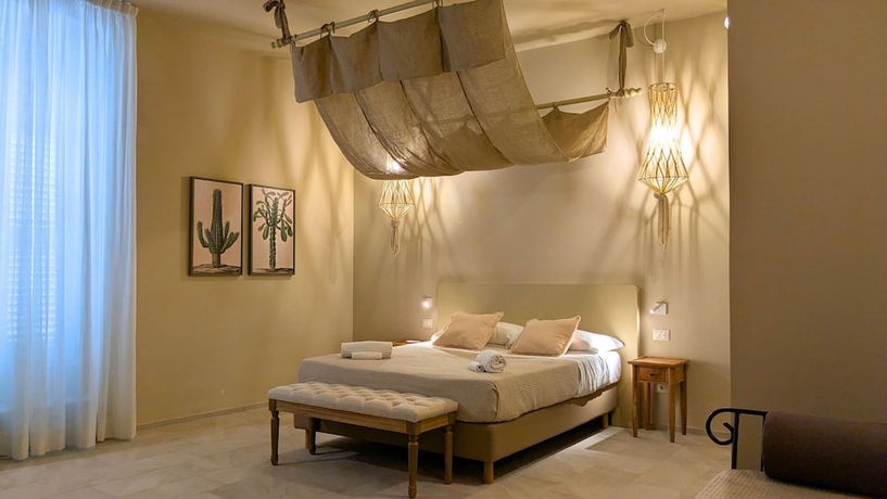 Imagen de la habitación del Palazzo Russo Ortigia Suite and Apartments. Foto 1