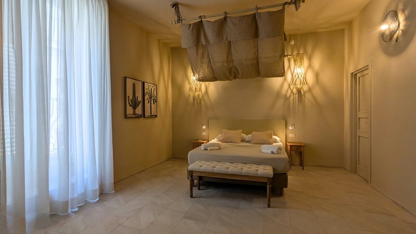 Imagen de la habitación del Palazzo Russo Ortigia Suite and Apartments. Foto 3