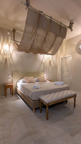 Imagen de la habitación del Palazzo Russo Ortigia Suite and Apartments. Foto 5