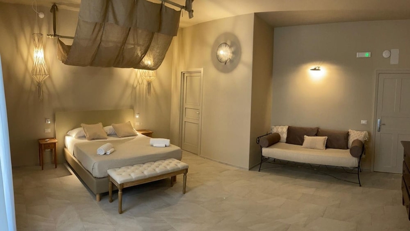 Imagen de la habitación del Palazzo Russo Ortigia Suite and Apartments. Foto 6