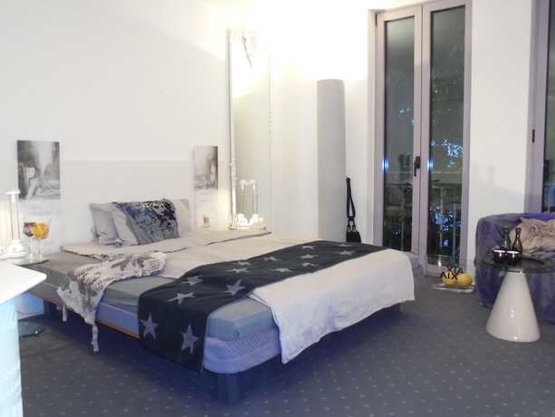 Imagen de la habitación del Pallazzo Alfonso. Foto 8