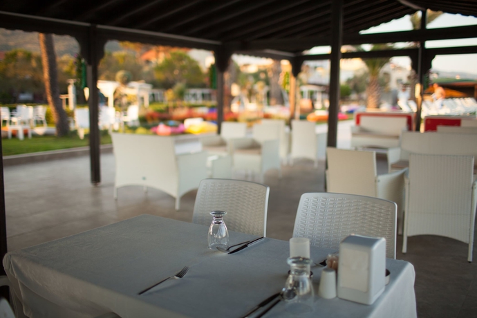 Imagen del bar/restaurante del Palm Beach Otel. Foto 1