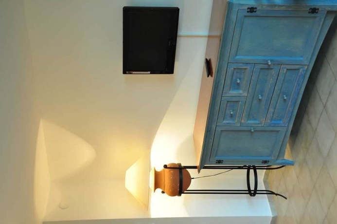 Imagen de la habitación del Palm Court Suites. Foto 4