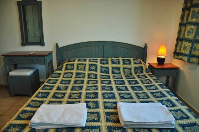 Imagen de la habitación del Palm Court Suites. Foto 7