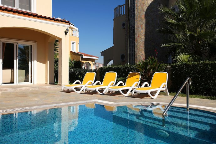 Imagen de los exteriores del Palm Lane Villa. Foto 13