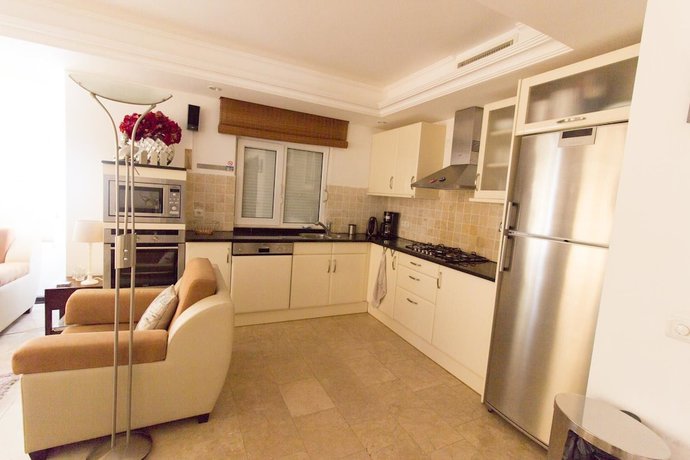 Imagen de la habitación del Palm Lane Villa. Foto 6
